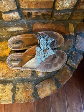 Clark’s Artisan sandals.